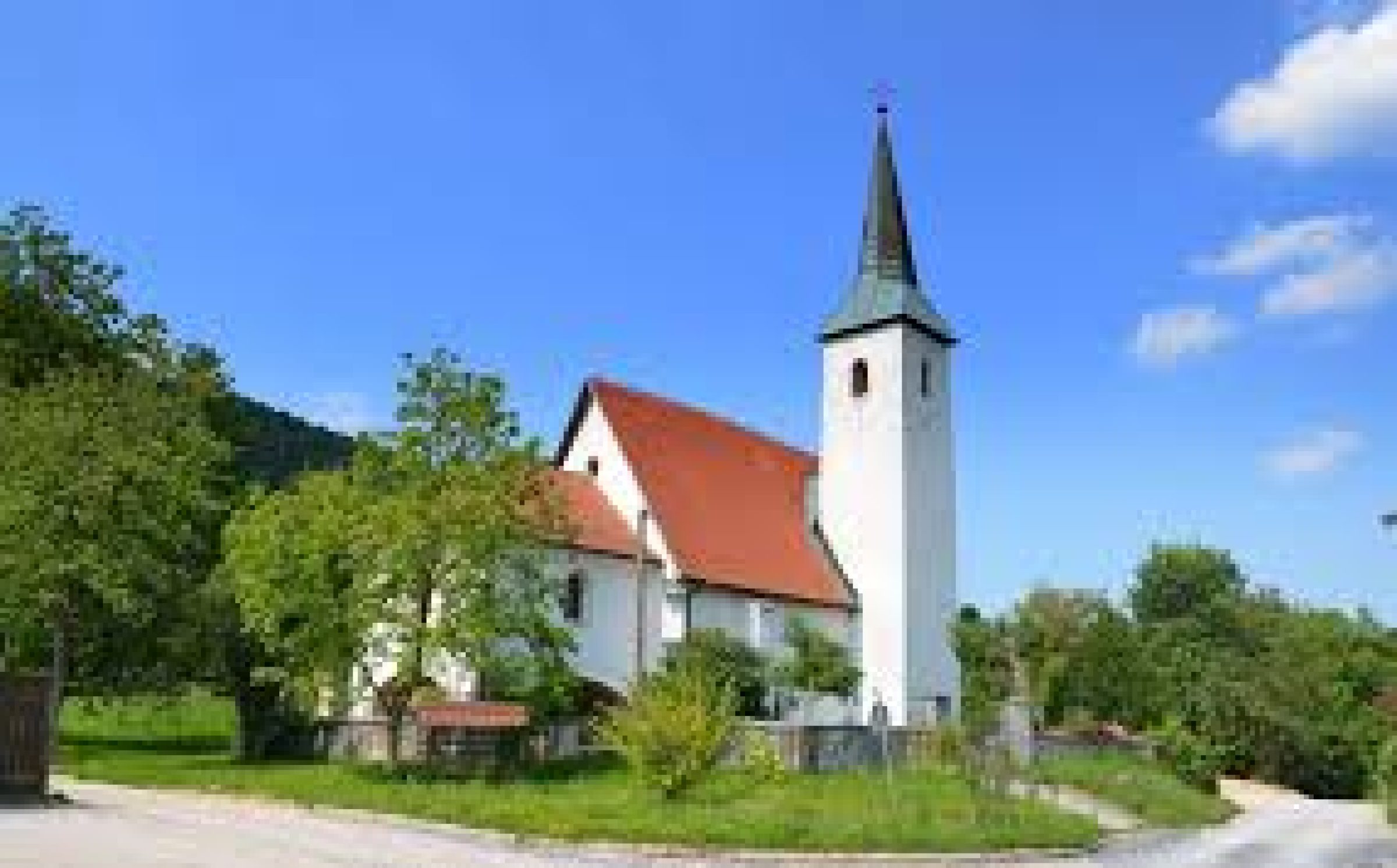 Ogled povečano sliko Župnijska cerkev sv. Mohorja in Fortunata v Podragi